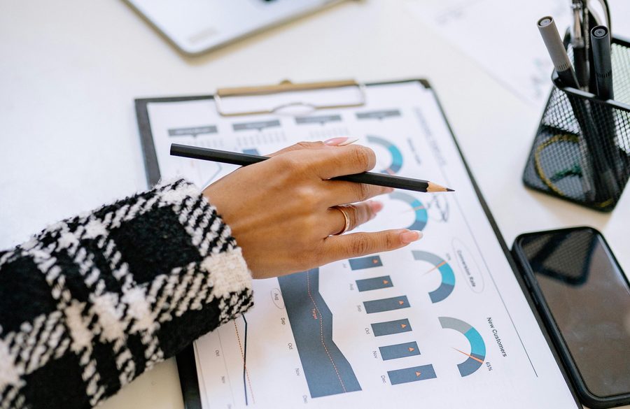 Accounting documents and financial charts for bookkeeping services