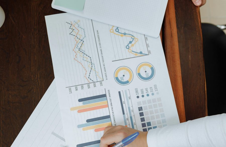 Financial charts reviewed for UAE corporate tax compliance